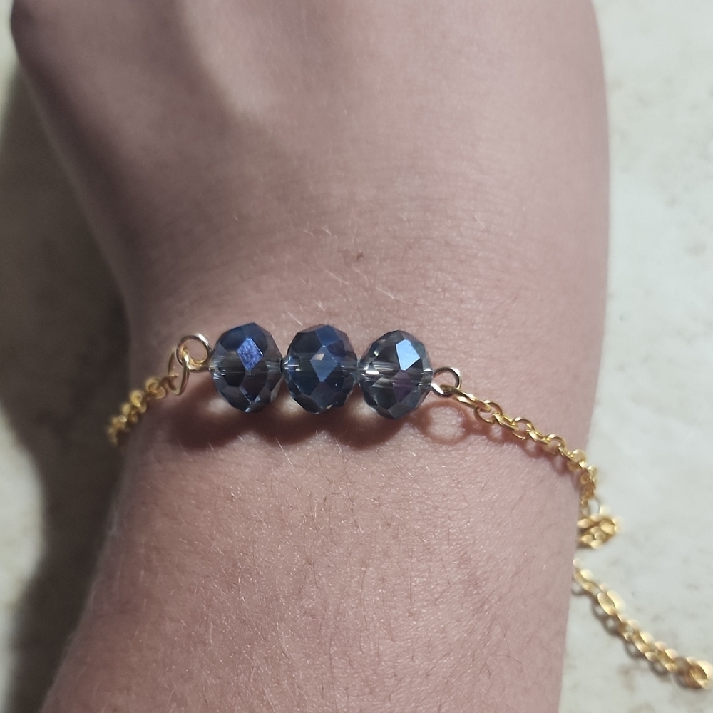 Elegant Gold Bracelet with Blue Beads